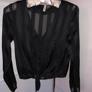 Sheer black blouse